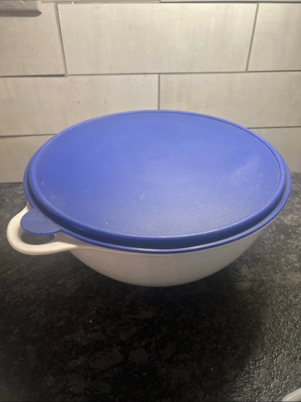 That’s a Bowl Tupperware Mixing Bowl with Blue Lid - White Bowl. 32 cup.